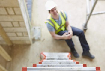 A construction worker who just suffered a work injury