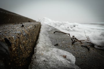 Snow-covered staircase posing a slip-and-fall risk